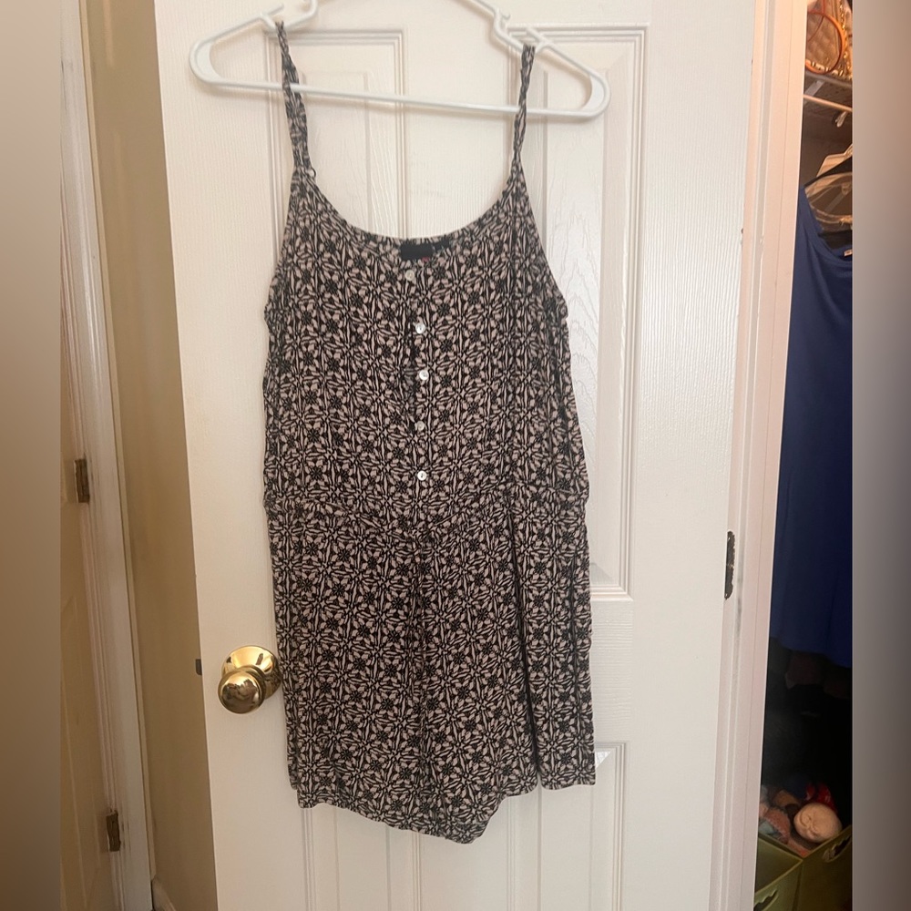 Eye Candy size Large romper.